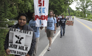 Scores of farm workers, activists march on Ben & Jerry’s