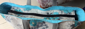 RG bag with recessed zipper