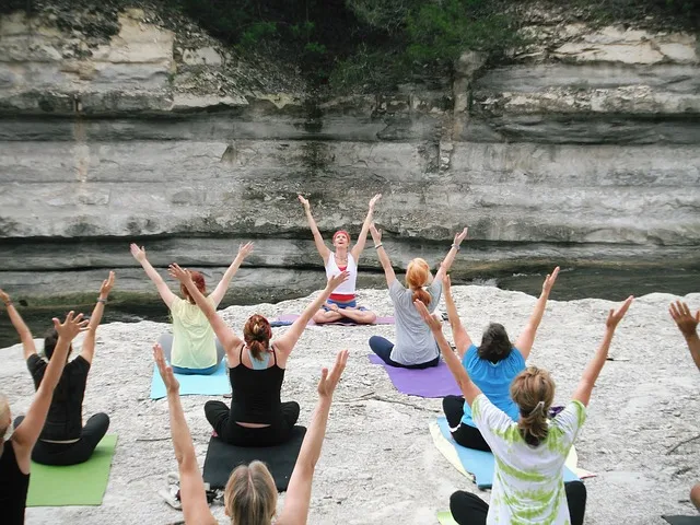 women attending yoga class