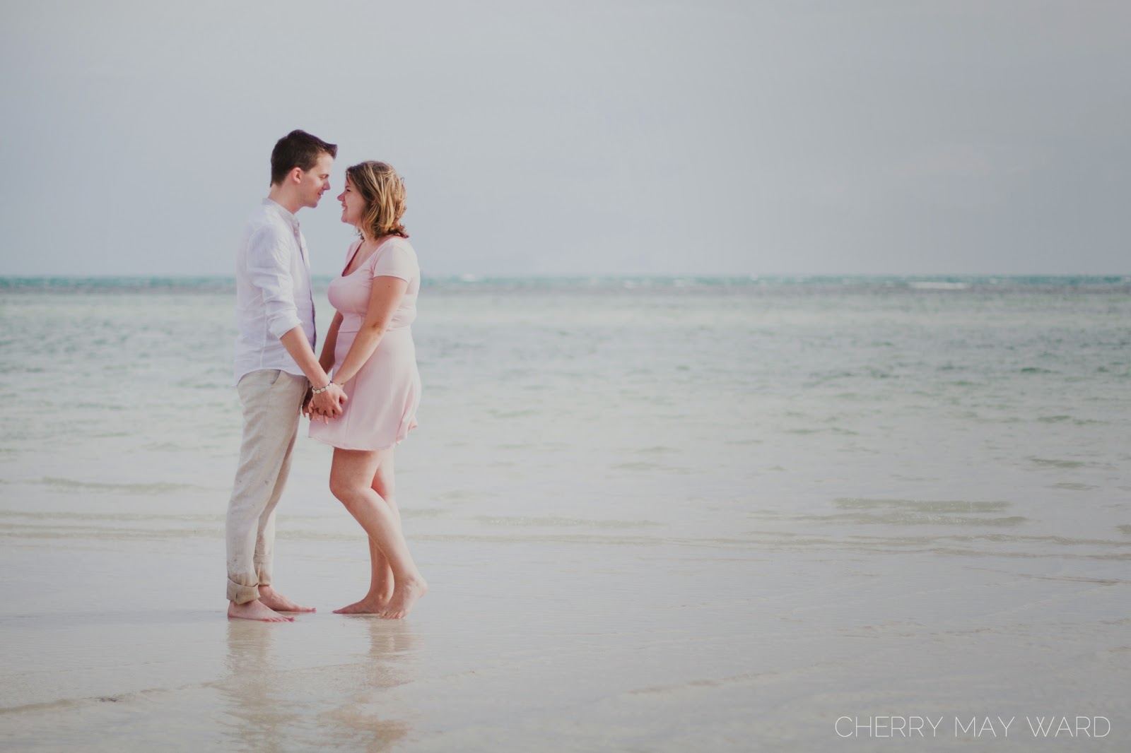 cute couple, beach engagement photos in Thailand, engaged in Thailand, Koh Samui beach photos, young and in love, couple having fun on the beach, 