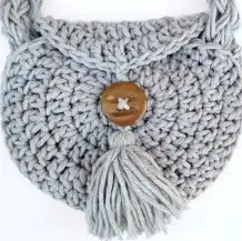 Bolso Redondo con Borla a Crochet