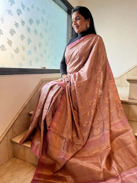 Salmon pink tussar saree with zari paisley butis