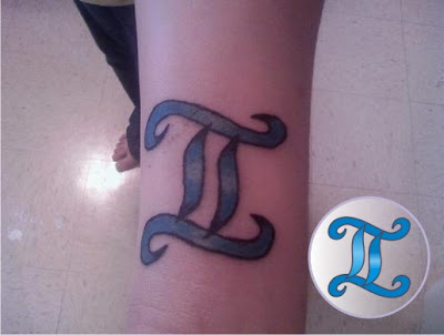 Labels gemini tattoo on the foot