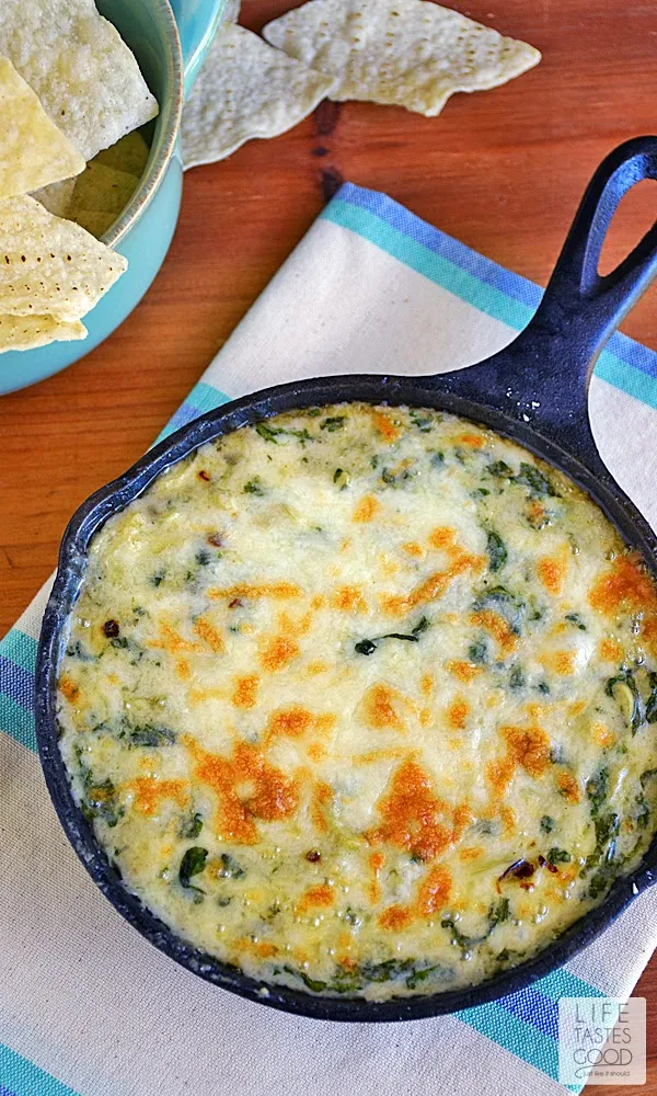 Spinach, artichokes, & a creamy, cheesy Mornay sauce make up this Spinach Artichoke Dip by Life Tastes Good. A tasty appetizer that is quick and easy to make in a skillet.