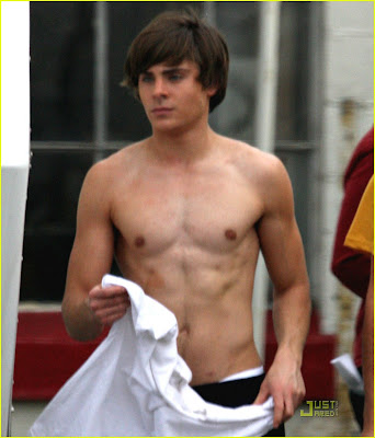 zac efron 2010 shirtless. zac efron tattoo shirtless.