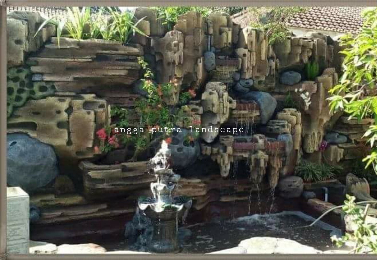 Jasa pembuatan dekorasi kolam tebing,dekorasi relief air terjun jombang