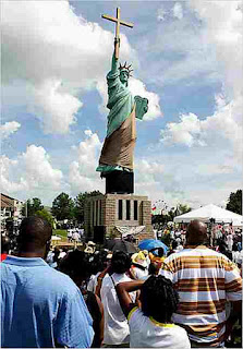 Tennessee replica of Statue of Liberty holding a cross
