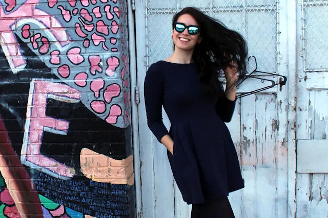 Fashion blogger Emma Louise Layla in Petit Bateau quilted cotton dress in San Francisco