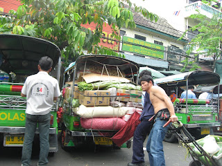 Early morning activity and Tuctucs in Bangkok