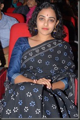 nitya menon latest at okkadine audio photos stills gallery cute and beautiful looking photo shoot photos stills images pics gallery