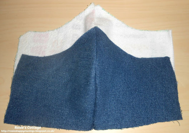 Super Easy DIY Masks: With the two sections of the mask sewn along the centre seams, in denim and in microfibre, we're ready to begin to assemble our mask.