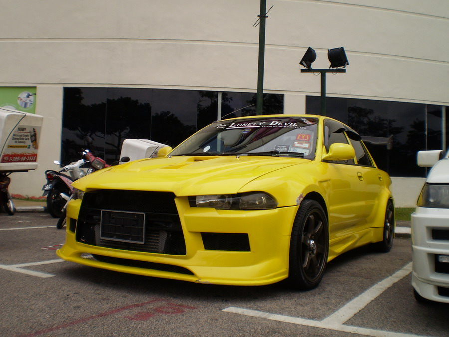 Proton Wira with Evo X body kit. Owned by member of team Lonely Devil.