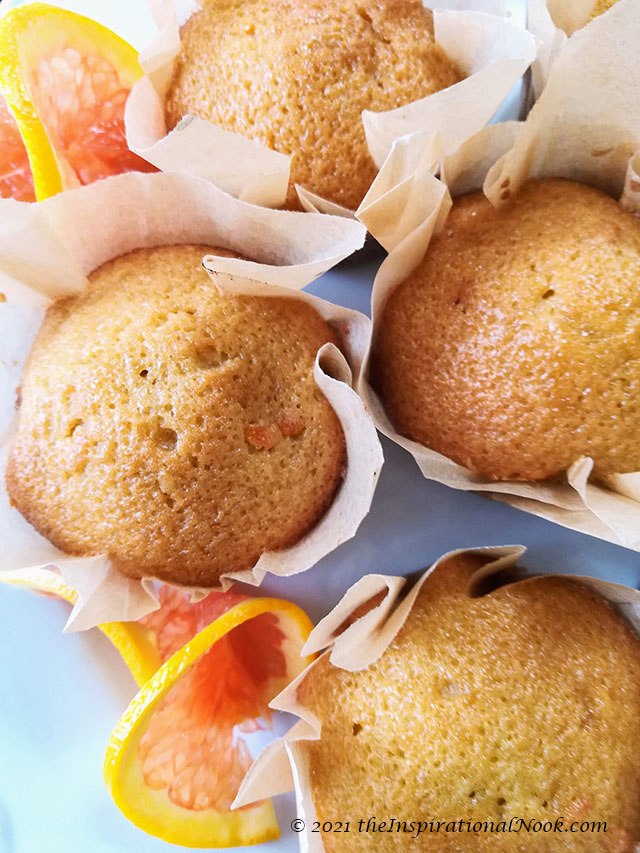 Orange olive oil muffins with slices of orange