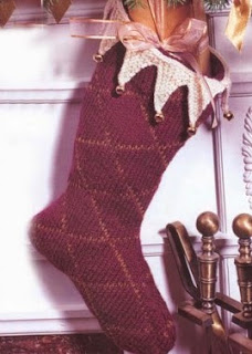 http://www.yarnspirations.com/patterns/burgundy-holiday-stocking.html