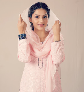 Mehreen Pirzada in Rose Color Dress with Cute Smile Wishing Eid Mubarak