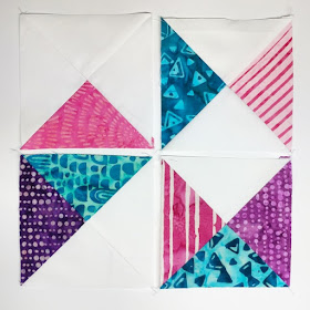 Heart quilt with quarter square triangles