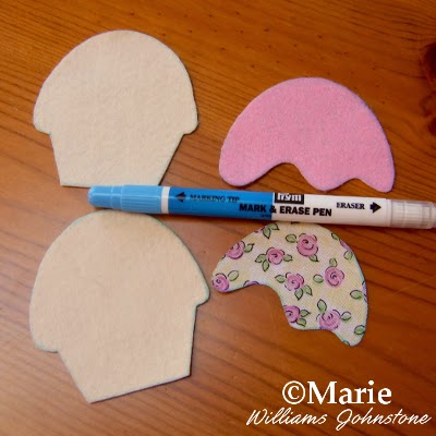 Water soluble fabric marker pen and cut shapes of felt and fabric