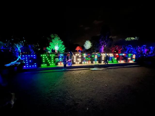 Large letters with lights on spelling out Enlightened