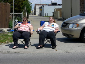 2 fat women in lawn chairs, redford memorial day parade
