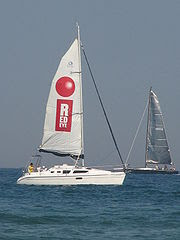 The RedEye newspaper advertised to its target market at North Avenue Beach with a sailboat billboard on Lake Michigan.