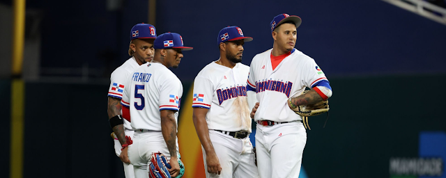 MIAMI, FLORIDA - MARCH 15: Wander Franco #5, Ketel Marte #4 , Jeimer Candelario #7, and Manny Machado #13 of Team Dominican Republic look on against Team Puerto Rico during their World Baseball Classic Pool D game at loanDepot park on March 15, 2023 in Miami, Florida. (Photo by Al Bello/Getty Images