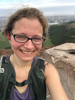 Selfie at the summit which is a cement pillar.