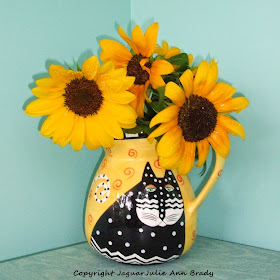 Sunflowers in a Laurel Burch Cat Ceramic Vase