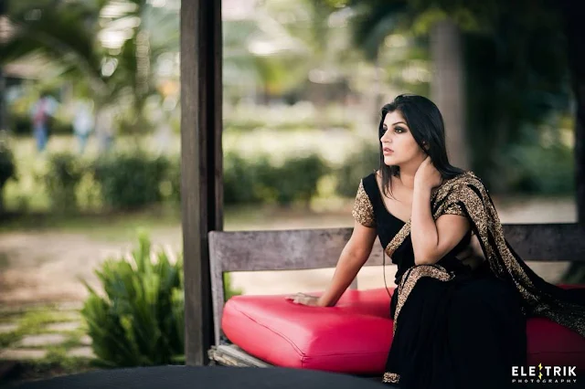 Yaashika Anand radiates heat and elegance in a stunning saree photoshoot, showcasing beauty and confidence.
