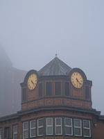 Double Townclock shrouded in fog