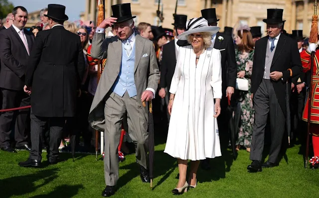 Duchess of Edinburgh wore a salmon pink wrap dress by Suzannah. Princess Anne floral print dress, Duchess of Gloucester gray dress