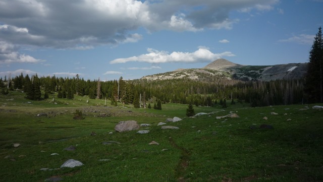 Nice view! After running down the mountain to a man and 3 teenagers (heard their voices from afar & hoped they could help). Said I had reached "Heart Lake" but I think it was really Little Long Lake. So I hiked a few miles west until I reached a dirt road