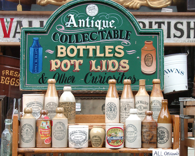Antique collectable bottles, pot lids, Portobello Road Market, Portobello Road, Notting Hill, London