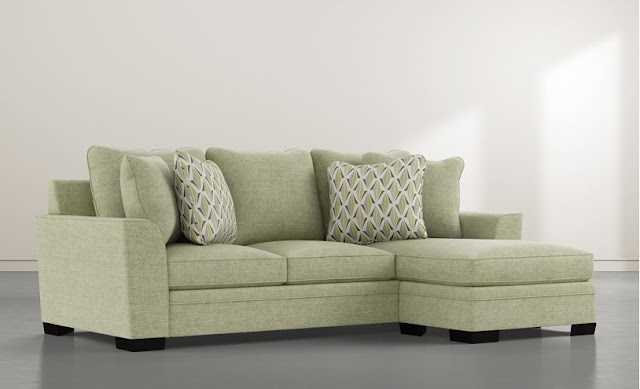 sage green sofa living room