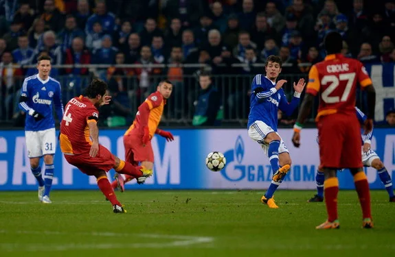 Galatasaray player Hamit Altıntop shoots to score his team's first goal against Schalke