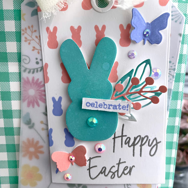 Peeps Easter Tag created with: Scrapbook.com peeps stencil, nested peeps die, celebrate expressions stamp, autumn leaves die, butterflies 2 die, nested tags die, sprigs die, sherbet patterned paper pad; Tim Holtz distress oxide in saltwater taffy, salvaged patina and shaded lilac; Pinkfresh jewels; Ranger super fine silver embossing powder