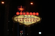 I think I like downtown Las Vegas before they added the overhead screens and . (vegas sign)