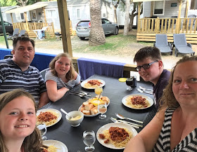 family eating outdoors