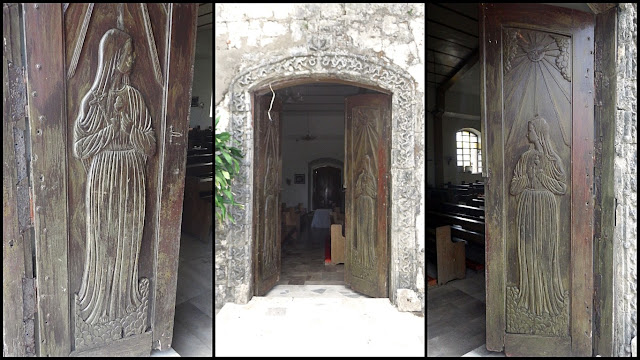 carved hardwood door panels of San Antonio De Padua Parish Church in Pambujan Northern Samar