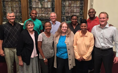 Back row: Thomas More Society (TMS) attorney Steve Crampton and TMS clients Ron George, Pastor Ken Griepp, Deborah Ryan, Brian George. Front row: TMS clients Patricia Musco, Prisca Joseph, Anne Kaminsky, Sharon Richards, and TMS attorney Martin Cannon.