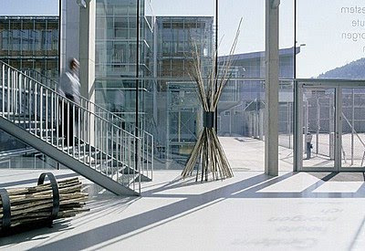 entrance to modern building with sculpture