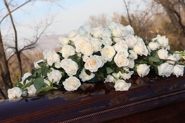 roses on casket (1 of 1) roses on casket (1 of 1)