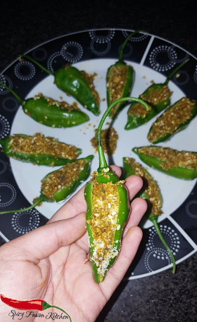 stuffed fried green chilies recipe, Bharli Mirchi, Bharwan Mirch green chilies, indian, indian recipe, indian cuisine, spicy food, dry relish, relish, rice dishes, traditional, traditional indian recipe, traditional indian side dish, side dish, stuffed chilies, fried chilies, food, food photography, pinterest food, spicy food recipe, spicy food pictures, food styling, food styling pictures, spicy fusion kitchen, organic chilies, organic vegetables