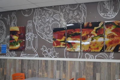 " Interior design of Twins Pizza and Burgers restaurant in Paramaribo"