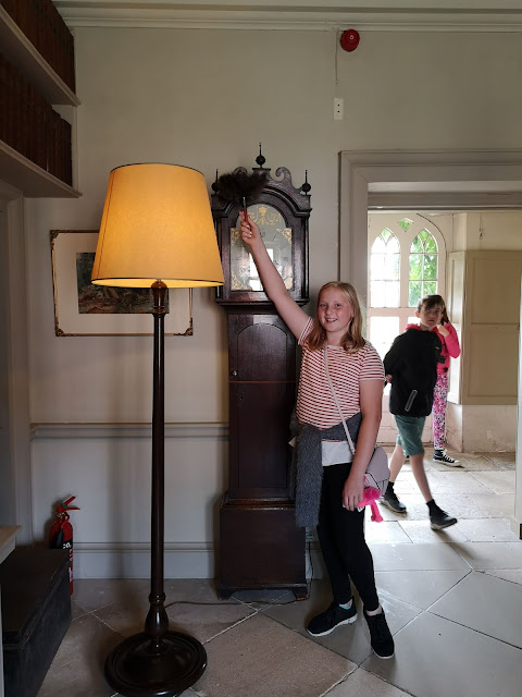 Tween dusting at National Trust house