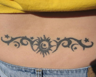 Tribal Moon and Star Tattoo, Lower Back [Image Credit: sleepishly]