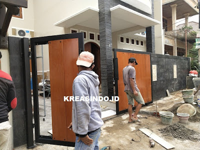 Pintu Pagar Besi Kombinasi Kayu pesanan Bpk Wimbo di Perum Pelni Depok