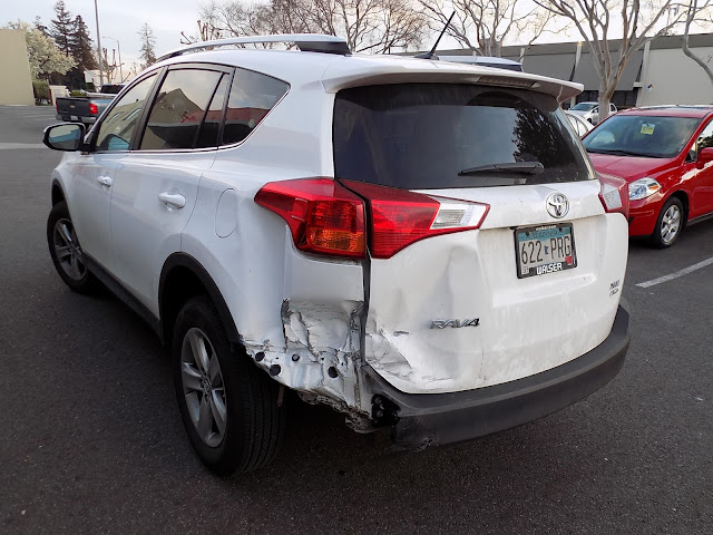 Part of bumper is missing after Toyota was hit from behind.