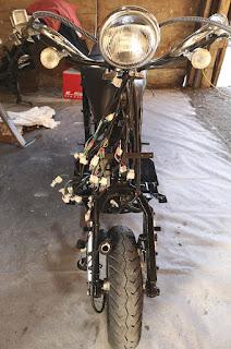 Front view of wiring loom on converted electric moped scooter