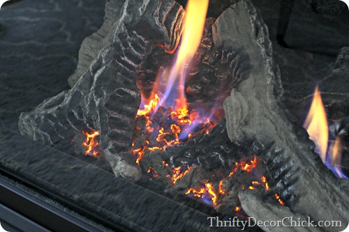 replacing embers in fireplace