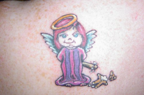 Small cartoon angel girl tattoo.